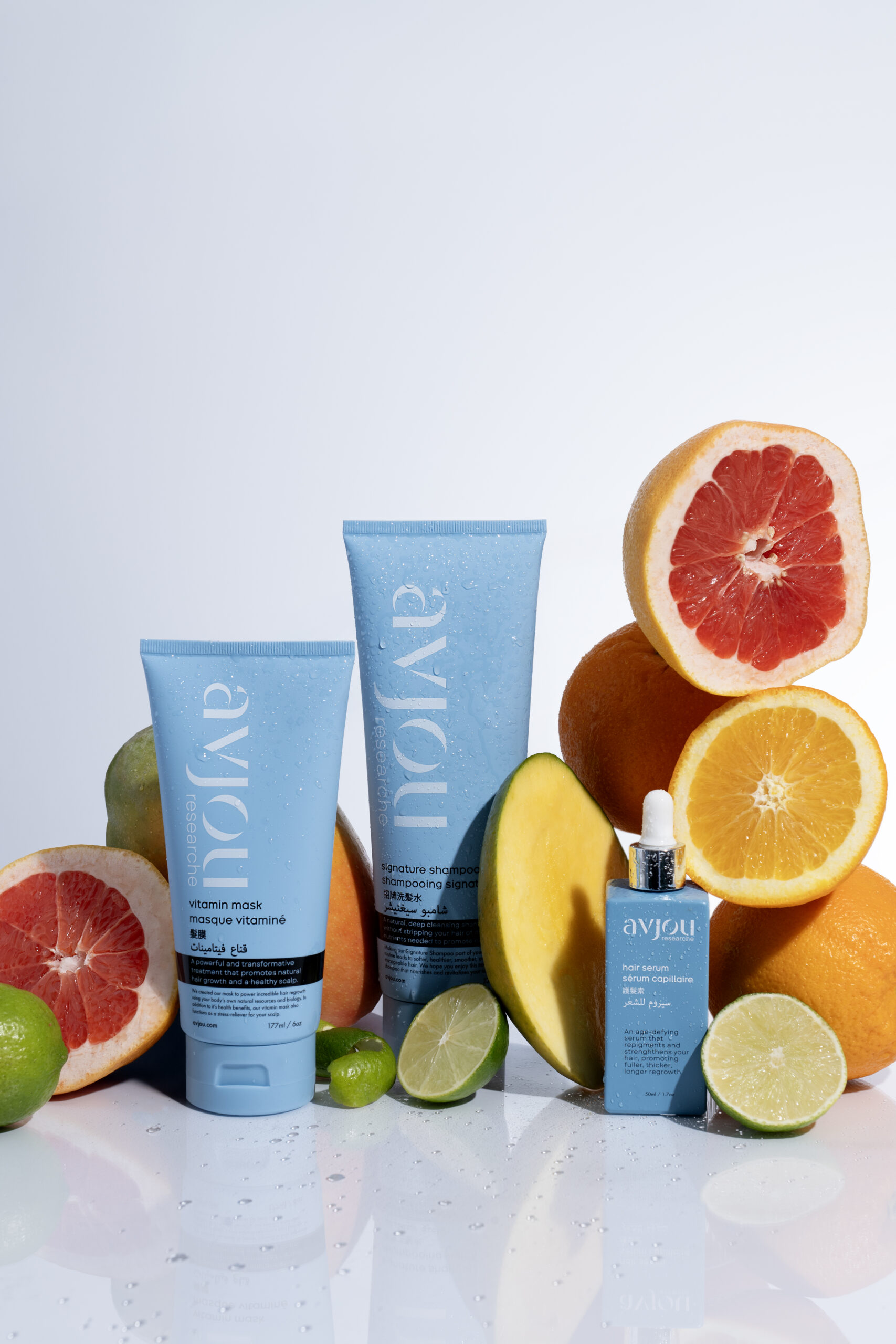 Hair care product products with fresh fruits: lime, mango, oranges and grapefruit